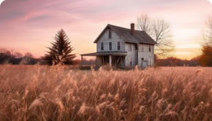 photo d'une maison au milieu d'un champs